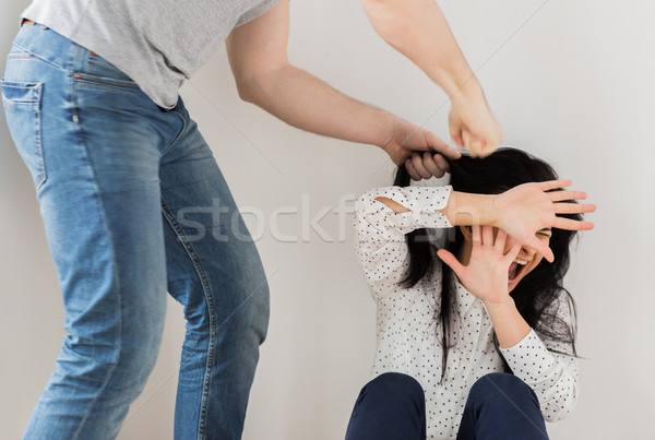 unhappy woman suffering from domestic violence Stock photo © dolgachov