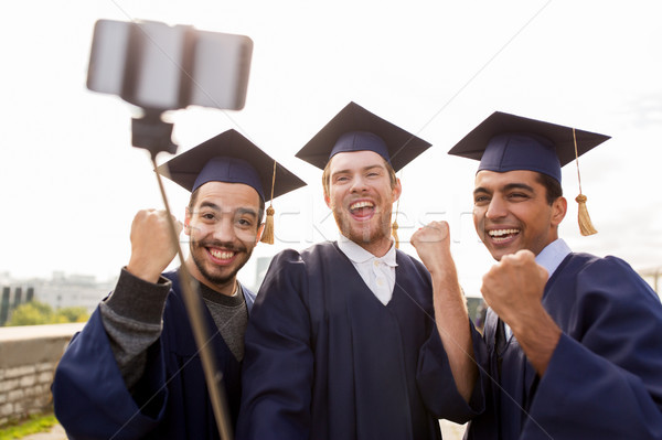 Stockfoto: Gelukkig · mannelijke · studenten · afgestudeerden · onderwijs