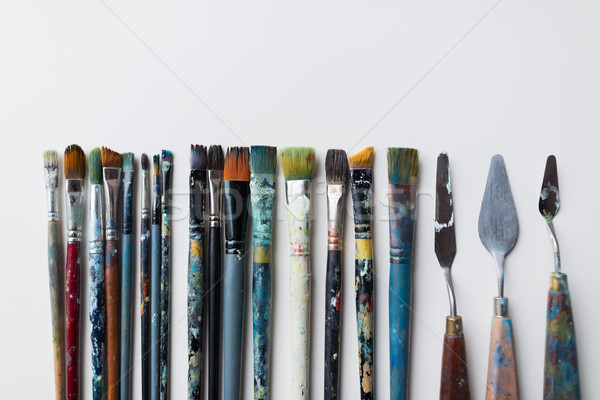 palette knives or painting spatulas and brushes Stock photo © dolgachov