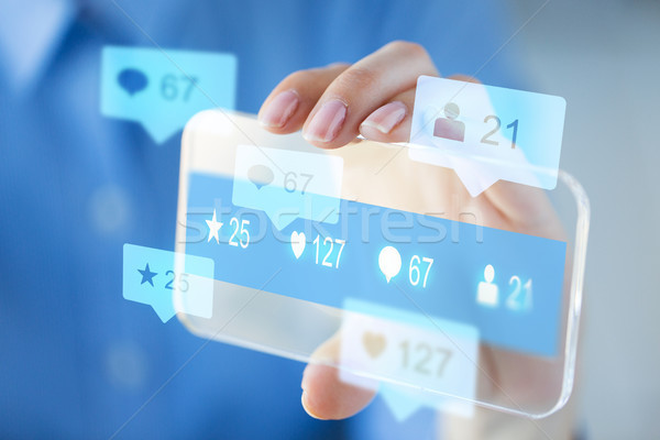 Kéz közösségi média ikonok okostelefon üzlet jövő Stock fotó © dolgachov