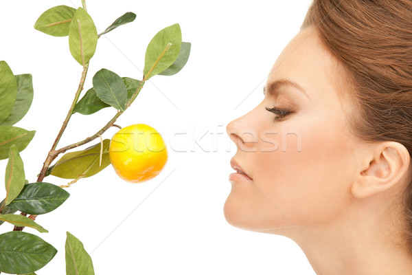 Foto d'archivio: Donna · limone · ramoscello · foto · faccia · frutta