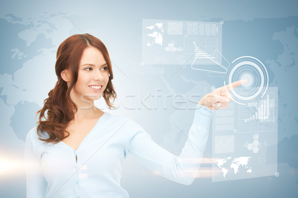 businesswoman touching virtual screen Stock photo © dolgachov