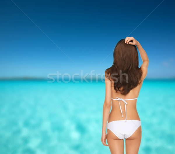 Kadın poz beyaz bikini yaz tatil Stok fotoğraf © dolgachov