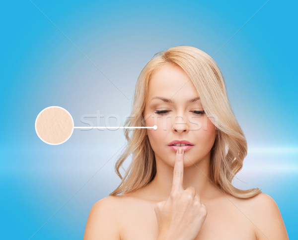 woman touching her lips Stock photo © dolgachov