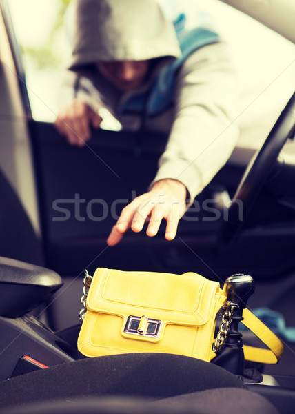Tolvaj lop táska autó közlekedés bűnözés Stock fotó © dolgachov