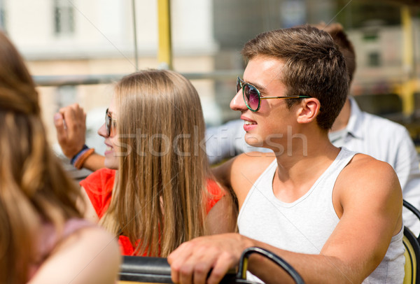 Mosolyog pár utazó turné busz barátság Stock fotó © dolgachov