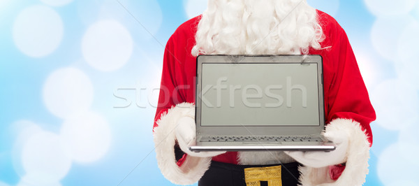 Kerstman laptop christmas advertentie technologie Stockfoto © dolgachov