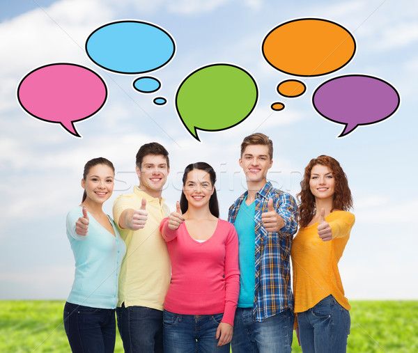 Groupe souriant adolescents amitié [[stock_photo]] © dolgachov