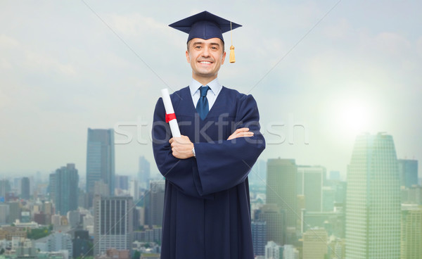 Sonriendo adulto estudiante diploma educación graduación Foto stock © dolgachov