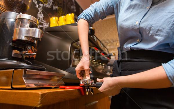 close up of woman making coffee by machine at cafe Stock photo © dolgachov