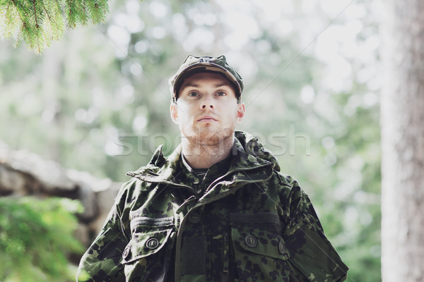 young soldier or ranger in forest Stock photo © dolgachov