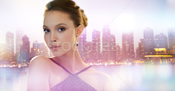 Piękna młodych asian kobieta kolczyk piękna Zdjęcia stock © dolgachov