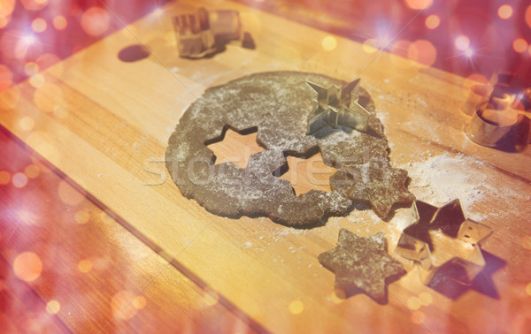 christmas gingerbread dough and molds on board Stock photo © dolgachov