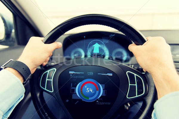 Close Up Of Man Driving Car With Volume Level Icon Stock