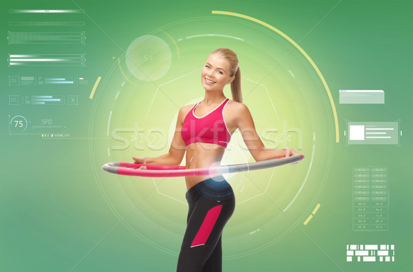 Jonge vrouw hoelahoep fitness sport Stockfoto © dolgachov
