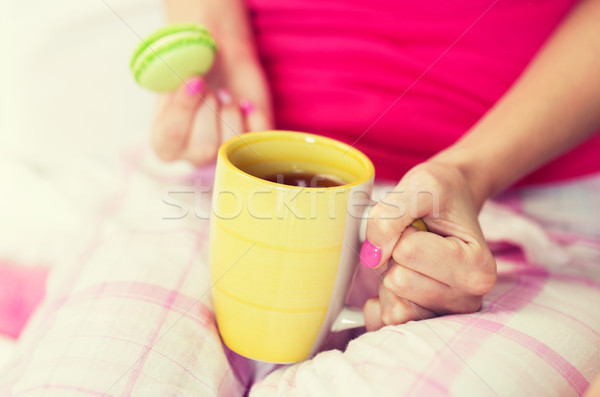 close up of young woman with tea cup Stock photo © dolgachov