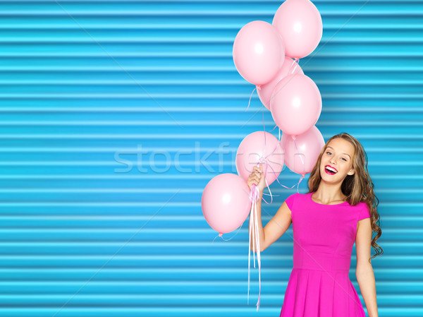 Feliz mulher jovem menina adolescente rosa vestir pessoas Foto stock © dolgachov