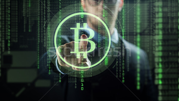бизнесмен bitcoin голограмма Финансы бизнеса Сток-фото © dolgachov