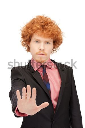 man making stop gesture Stock photo © dolgachov