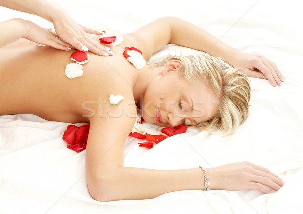 Massaggio fiore petali foto signora salone Foto d'archivio © dolgachov