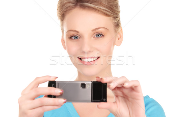 Stockfoto: Gelukkig · vrouw · telefoon · camera · foto · gezicht