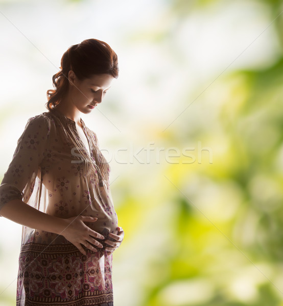 Сток-фото: силуэта · фотография · беременна · красивая · женщина · семьи · материнство
