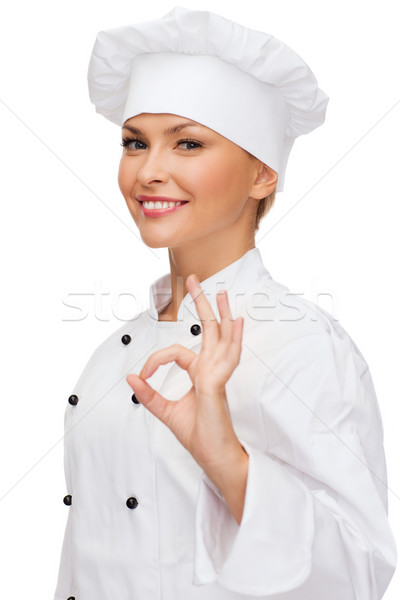 Lächelnd weiblichen Küchenchef Handzeichen Stock foto © dolgachov