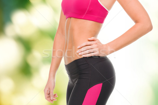 close up of female abs in sportswear Stock photo © dolgachov