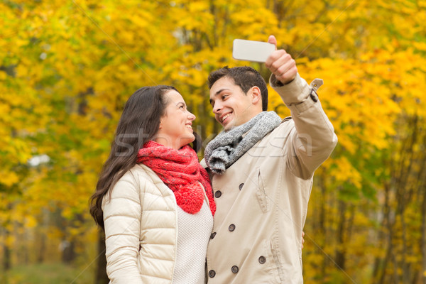 Stockfoto: Glimlachend · paar · najaar · park · liefde