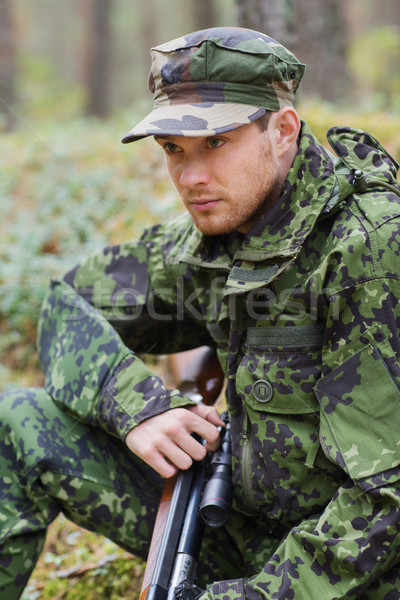 Jovem soldado caçador pistola floresta caça Foto stock © dolgachov