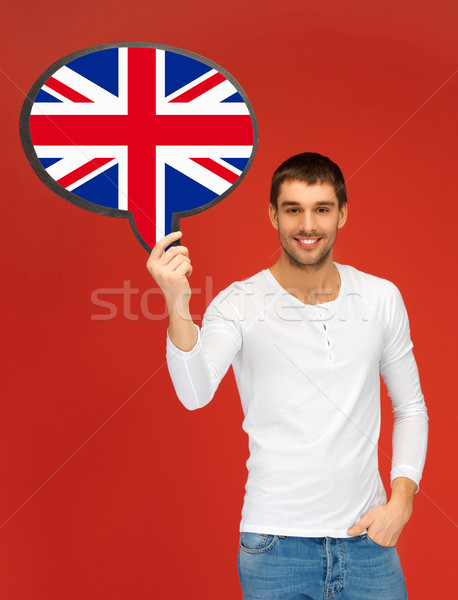 smiling man with text bubble of british flag Stock photo © dolgachov