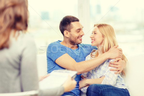 young couple hugging at psychologist office Stock photo © dolgachov