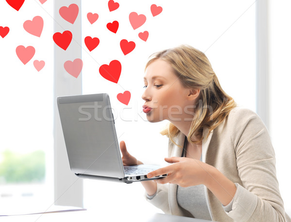 Nő küldés laptop számítógép virtuális kapcsolatok online Stock fotó © dolgachov
