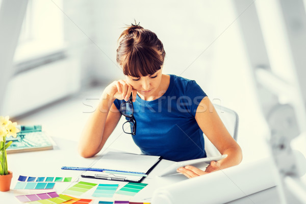 Stock photo: woman working with color samples for selection
