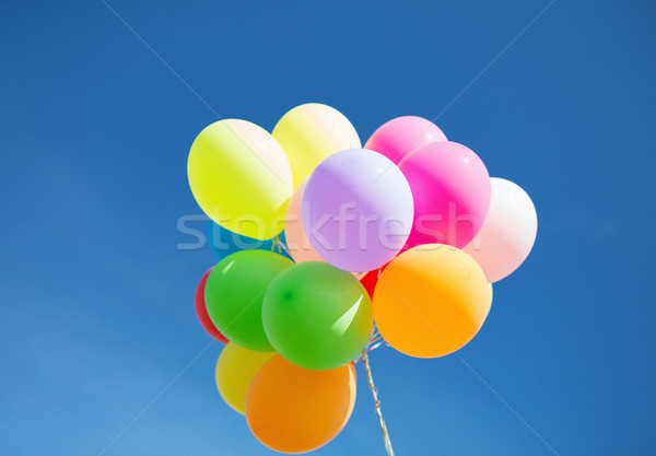 lots of colorful balloons in the sky Stock photo © dolgachov