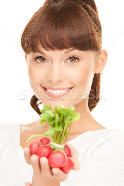 beautiful housewife with radish Stock photo © dolgachov