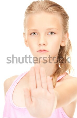 lovely girl showing stop sign Stock photo © dolgachov