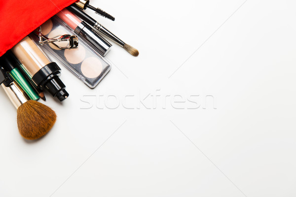 close up of cosmetic bag with makeup stuff Stock photo © dolgachov