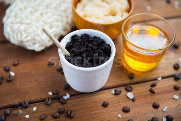 close up of coffee scrub in cup and honey on wood Stock photo © dolgachov