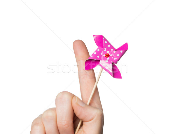 close up of hand holding pinwheel toy Stock photo © dolgachov