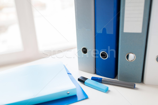 close up of ring binders and files on office table Stock photo © dolgachov