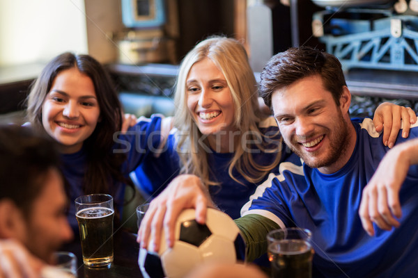 Football fans amis bière sport bar [[stock_photo]] © dolgachov