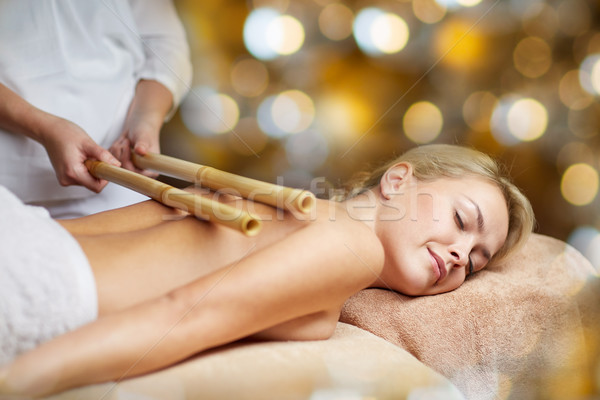 close up of woman lying and having massage in spa Stock photo © dolgachov