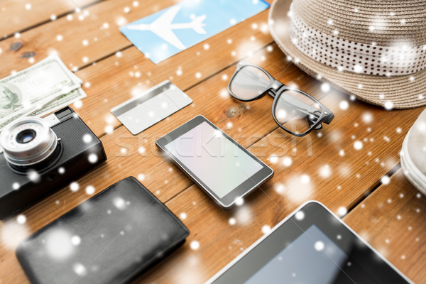 close up of gadgets and traveler personal stuff Stock photo © dolgachov