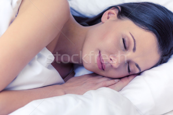 beautiful woman sleeping in bed Stock photo © dolgachov