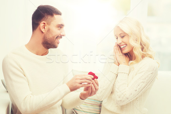 Hombre mujer anillo de compromiso Navidad amor Pareja Foto stock © dolgachov