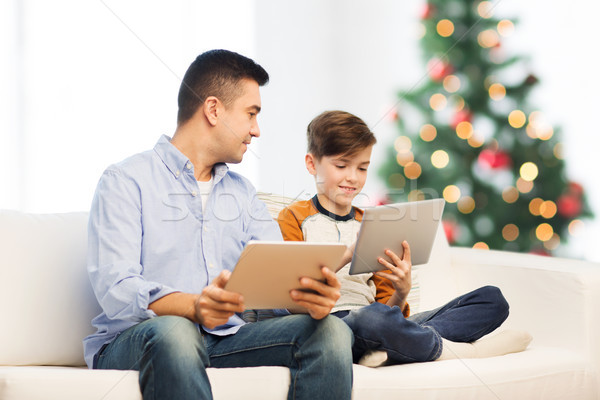Heureux père en fils Noël technologie famille [[stock_photo]] © dolgachov