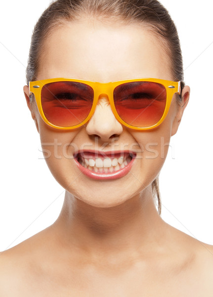 funny teenage girl in shades Stock photo © dolgachov