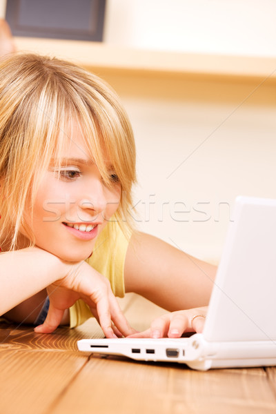 teenage girl with laptop computer Stock photo © dolgachov