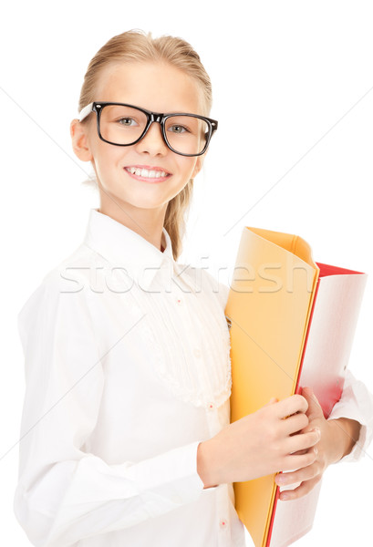elementary school student with folders Stock photo © dolgachov